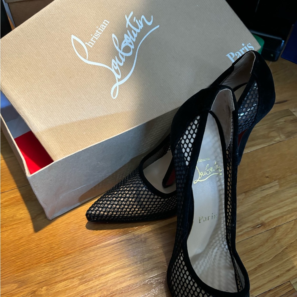 Louboutin mesh heels in black, size 9.